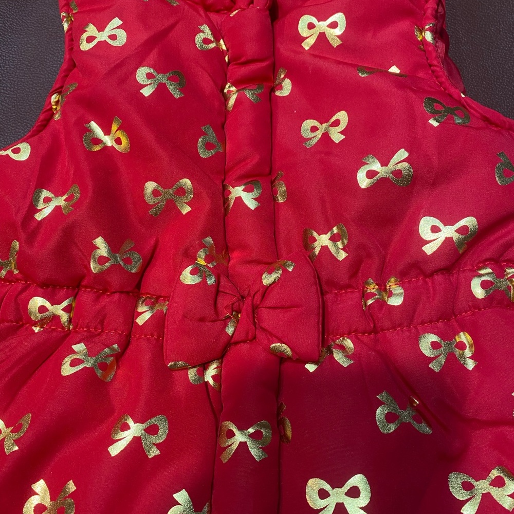 Red Puffer Vest with Gold Bow Pattern - Picture 2 of 6